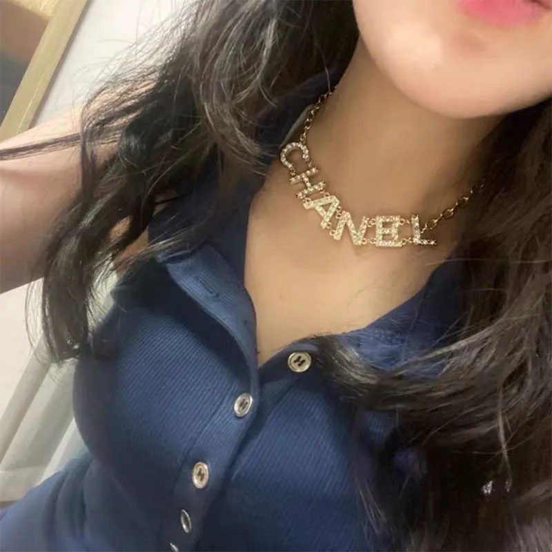 A necklace full of elegant diamond-shaped letters